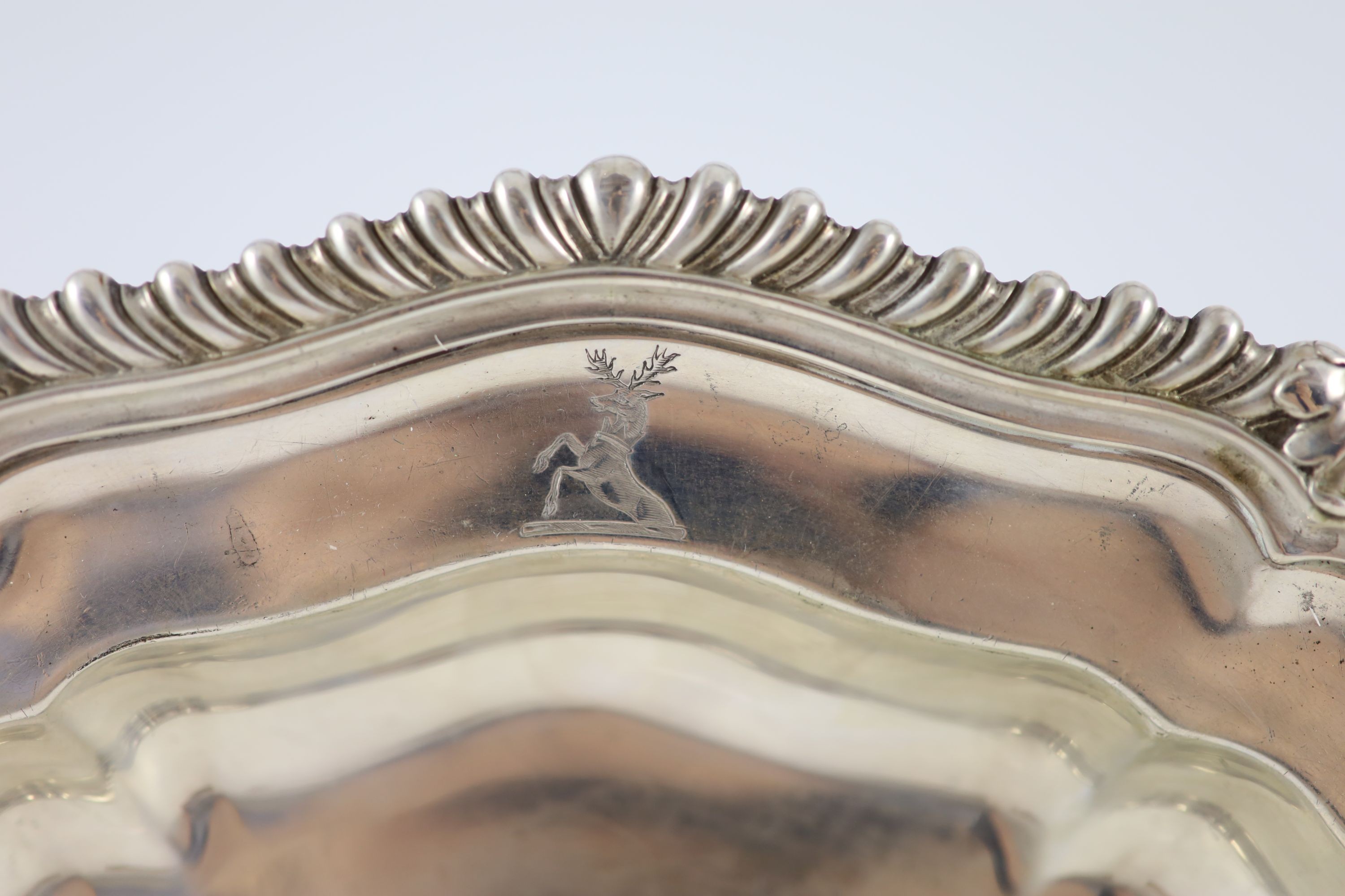 A pair of late George IV silver shaped circular dinner plates by Paul Storr